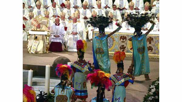 Aztec dancers perform before John Paul II